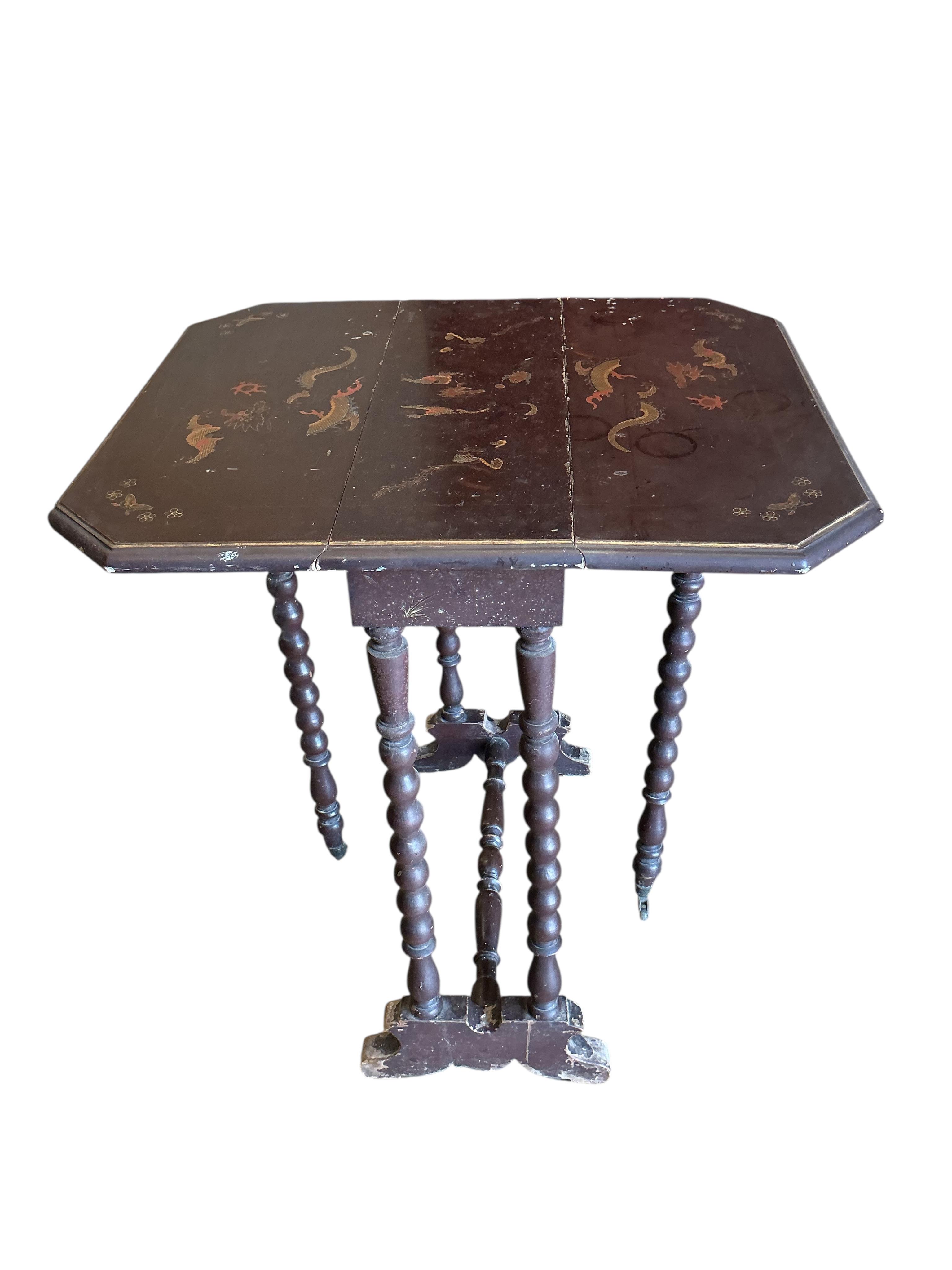 A chinoiserie lacquer bobbin turned Sutherland table, width 56cm, depth 21cm, height 69cm